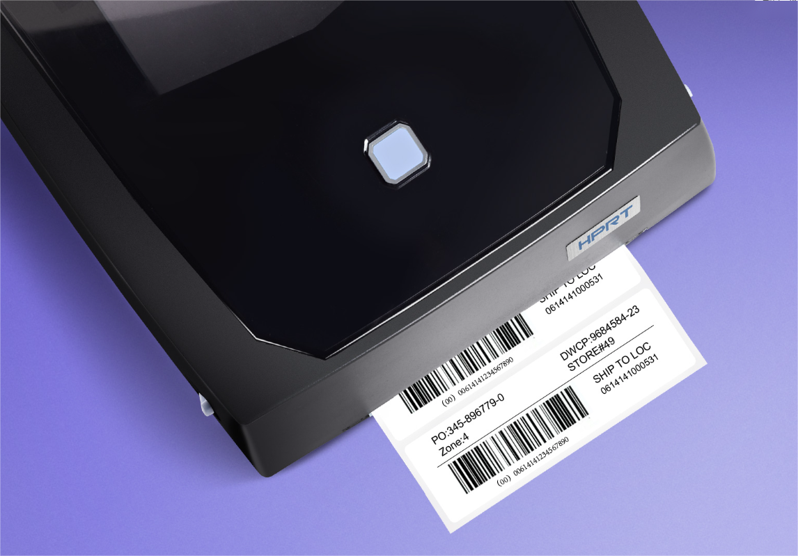 A label being printed from a barkod yazıcısı